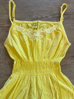 Y2K yellow Lucy Love babydoll top with lace detailing.